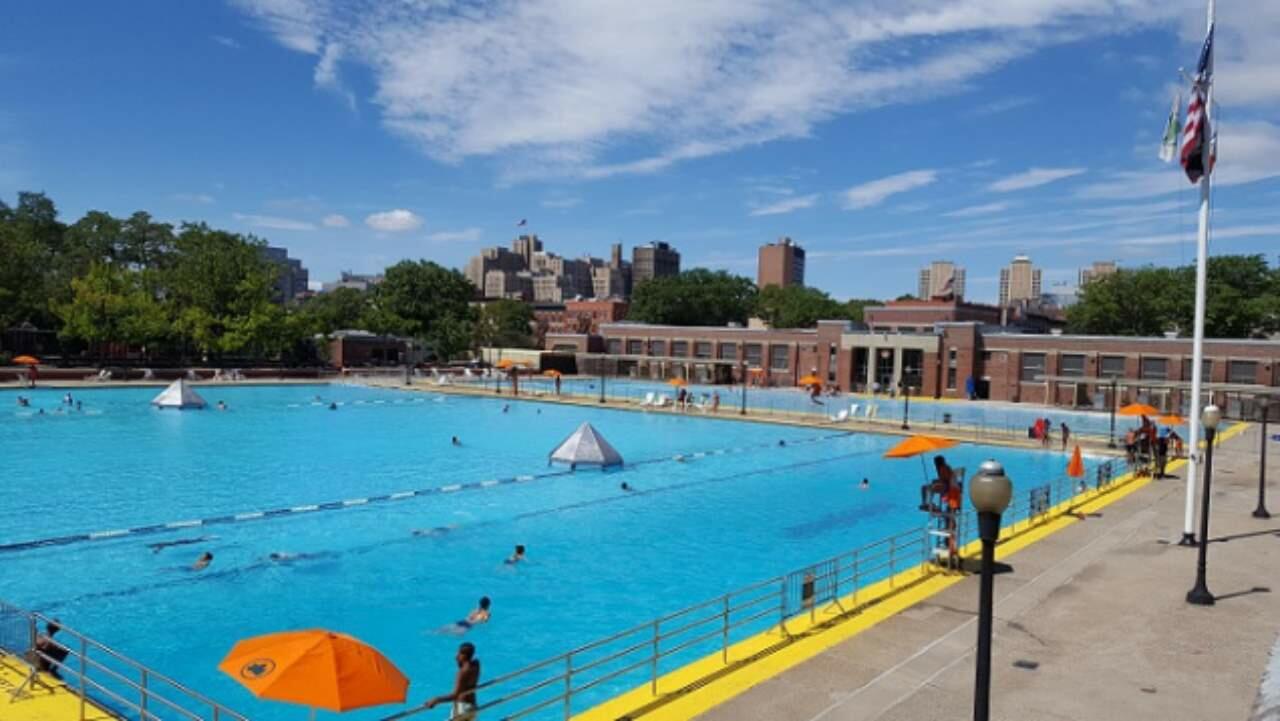 A large pool under a bright blue sky
